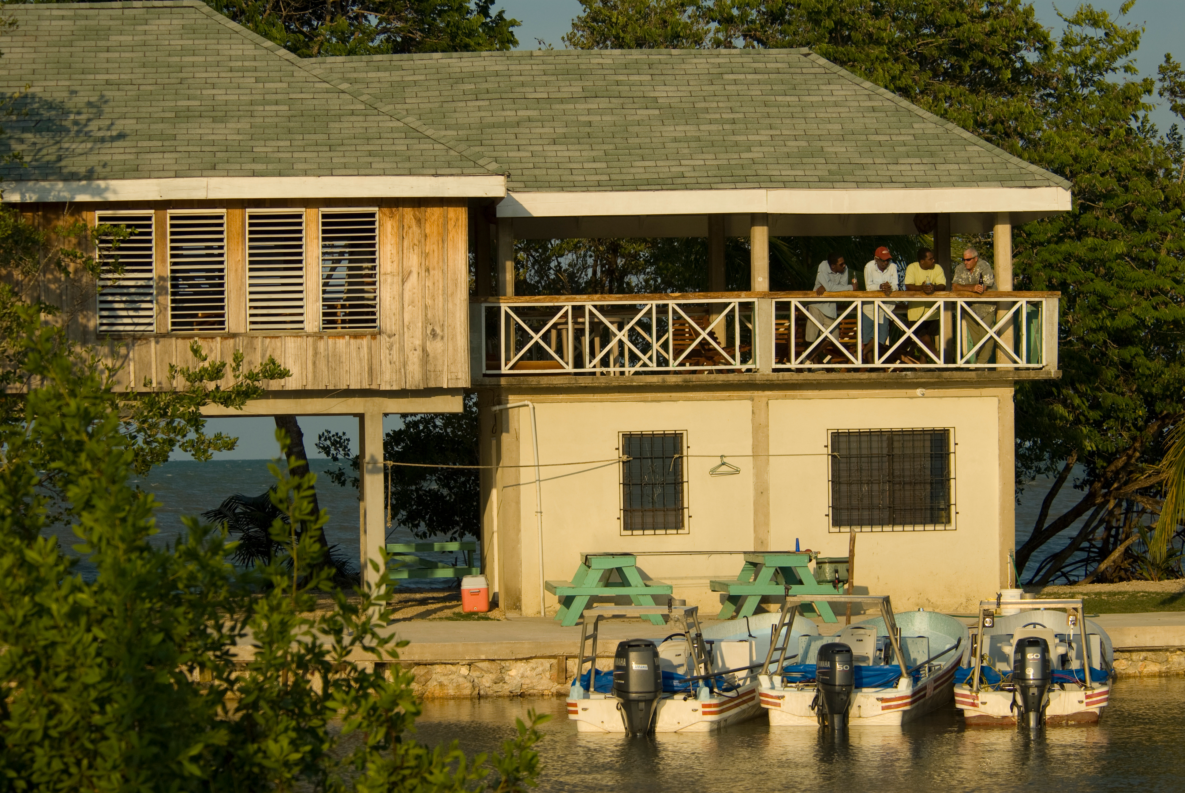 Main lodge dock side Garbutts fishing lodge Belize